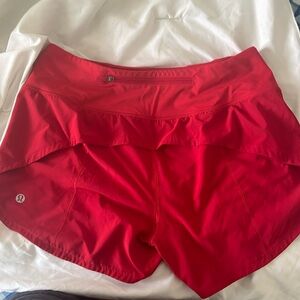Red Lululemon Speed Up shorts